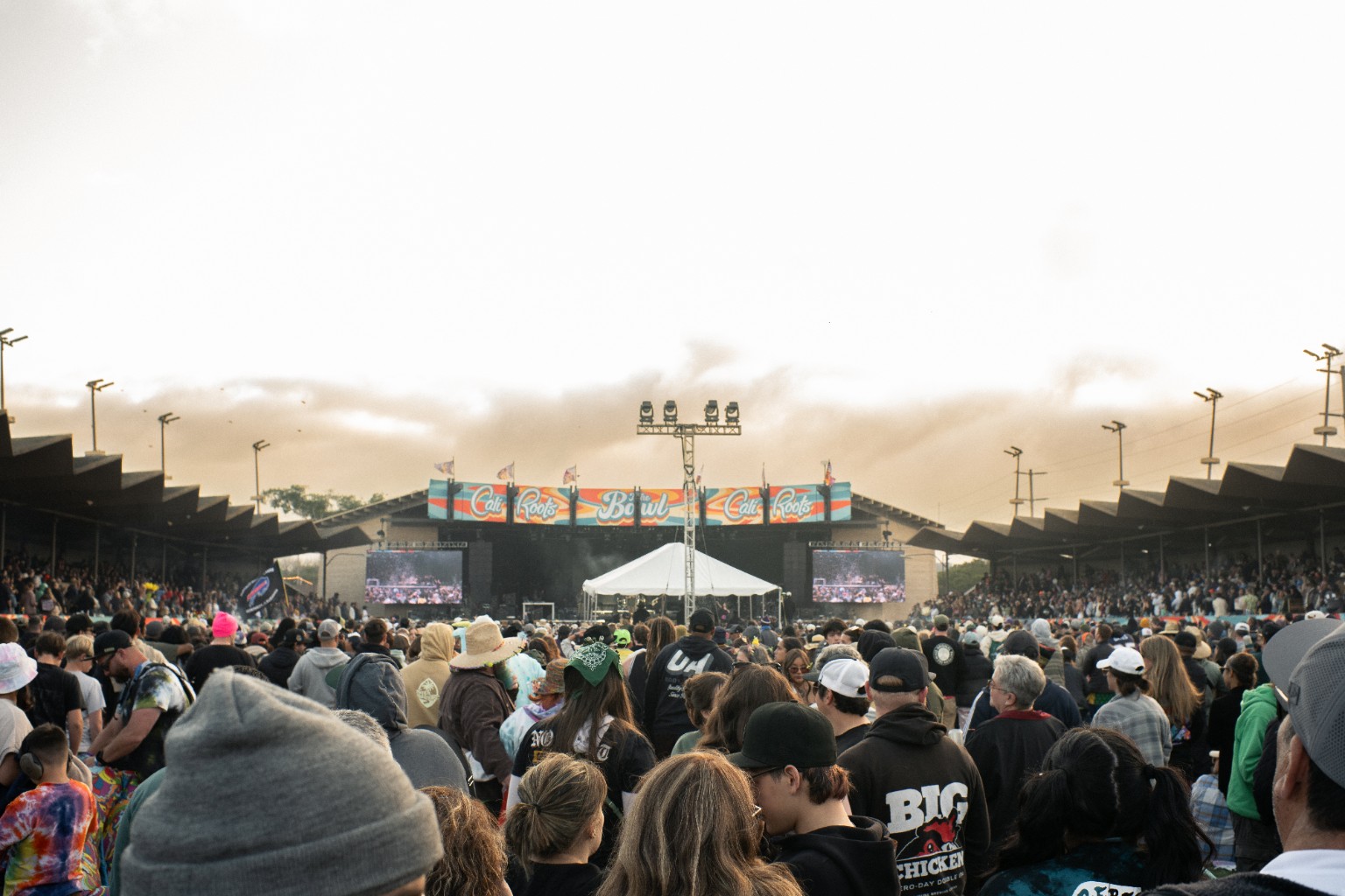 Outdoor music festival crowd and stage