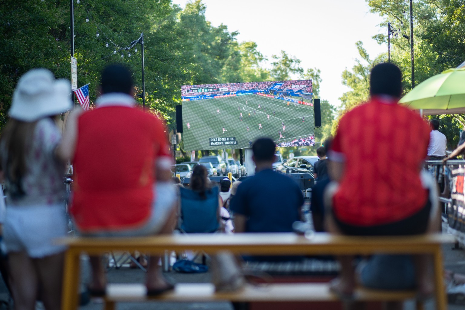 Outdoor crowd watching a live sporting event
